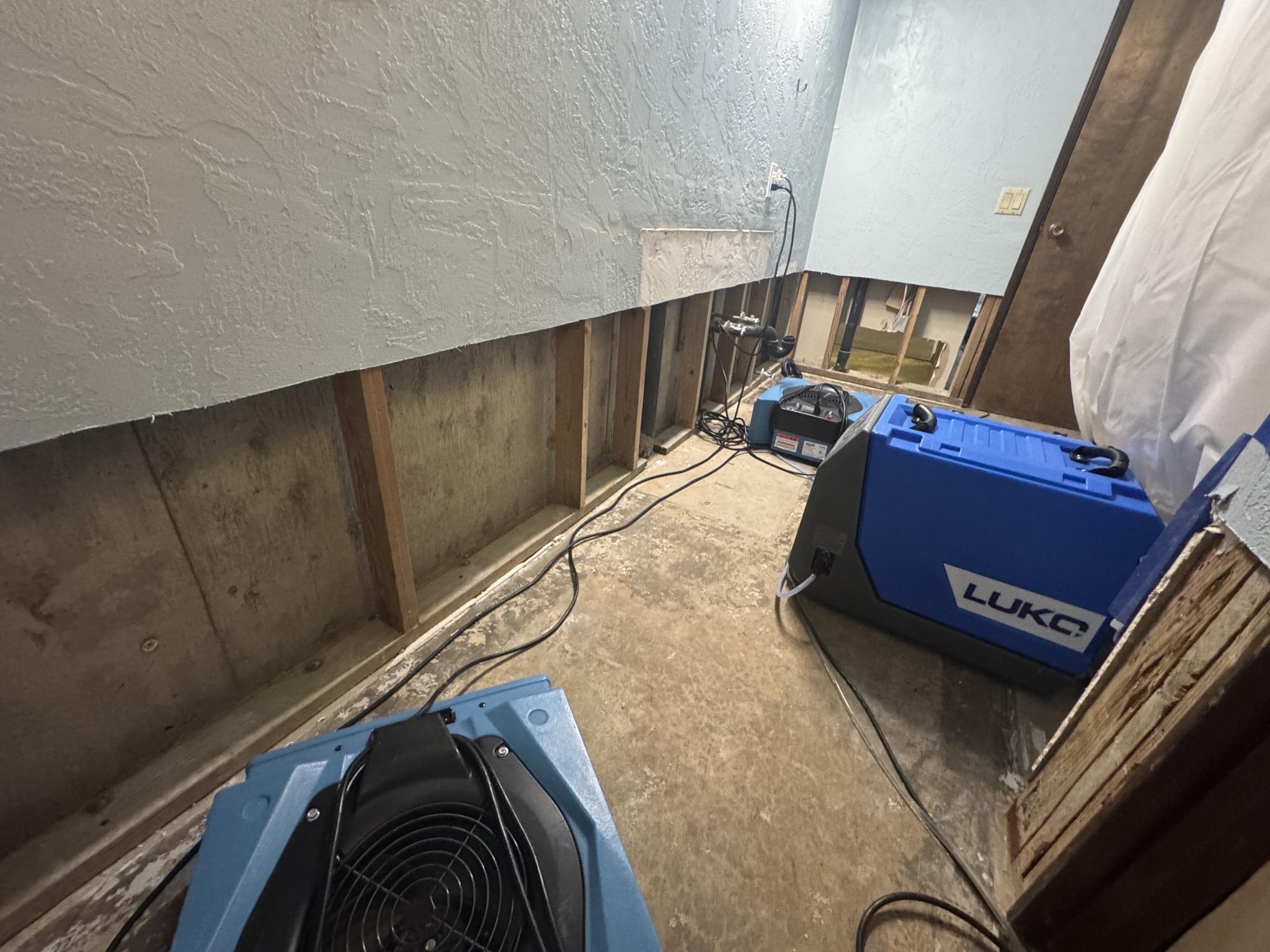 Water extraction and structural drying in progress at a St. Charles County property