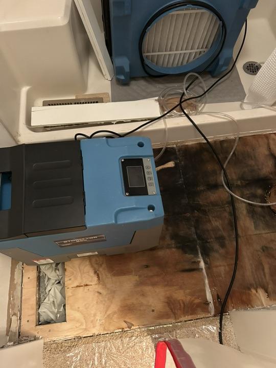 Water heater leak cleanup and flood damage restoration in St. Charles County