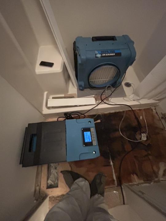 Industrial Dehumidifier in Damaged Bathroom