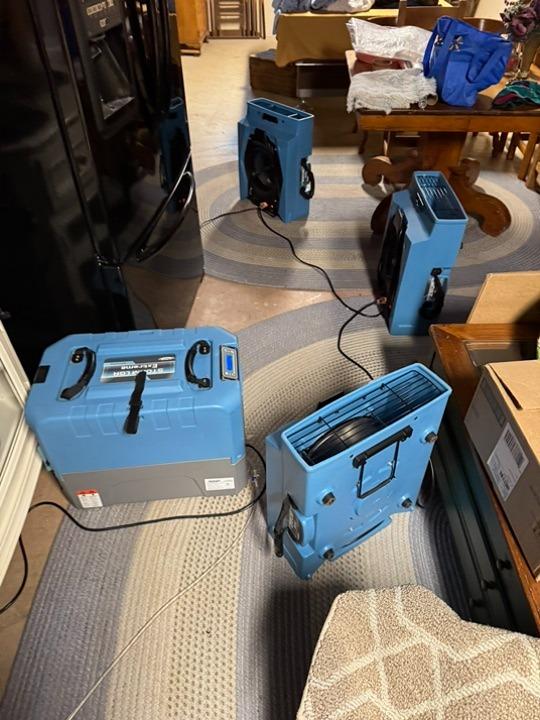 Water damage restoration equipment drying a home in Ballwin, Missouri